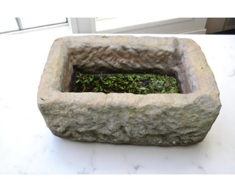 A small rectangular 19th Century stone trough.