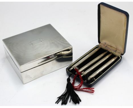 A George VI silver small cigar box, with engine turned decoration and Art Deco style vacant cartouche to cover, leather base 