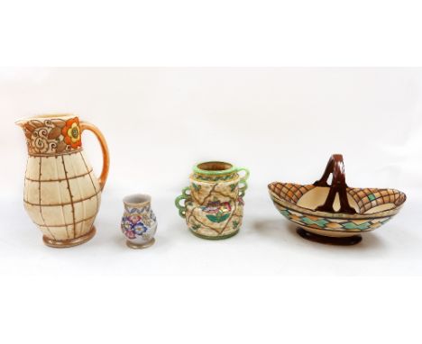 A Charlotte Rhead Bursley Ware tall jug with tubelined design and flowers (crazed); a novelty Charlotte Rhead for Crown Ducal