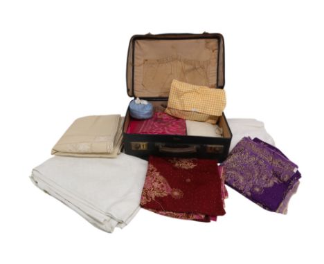 A 'Pandora's box' black 1940s' suitcase filled with white linen/cloth napkins, a case of handkerchiefs, vanity case purse, se