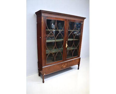 A George III mahogany glazed front display cabinet with ornate design to glazed doors having box with chequer detail, with gr