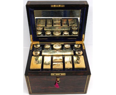 A Victorian coromandel gentleman's travelling vanity box, with brass mounted detail and central intertwined brass initials to
