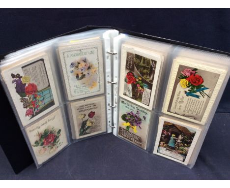 A large album of predominately early 20th century postcards. Featuring numerous Birthday greetings postcards, sentimental sce
