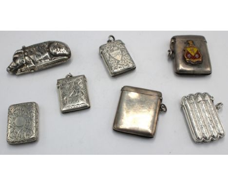A selection of seven silver vesta cases comprising of: a novelty Modern silver vesta case of pig / hog shape, marked only STE