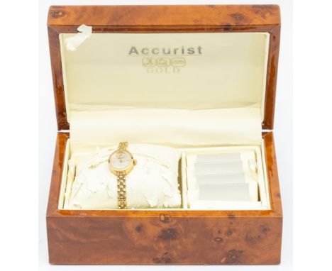 A ladies 9ct gold Accurist quartz wristwatch, comprising an oval silvered dial with applied baton markers, case approx 15mm, 