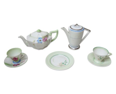 A Shelley Art Deco 'Anemone' patterned tea pot; a Shelley Art Deco tea cup and saucer with floral design; a Shelley trio in g