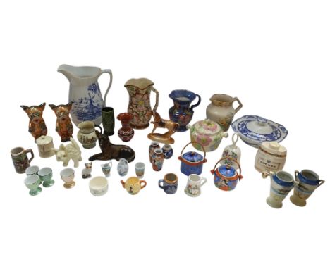 A collection of mid 20th Century china and ceramic items to include wash bowls, water jugs, cups with saucers, blue and white