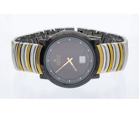 Junghans- a gentleman's Mega Solar ceramic two tone wristwatch, comprising a round brown signed dial with gilt dot markers an