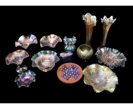 A collection of coloured carnival glass to include Northwood vases, bowls, dishes, marbles etc. chipping to some,&nbsp;
