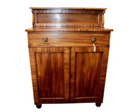 A narrow Regency mahogany chiffonier, with a fitted drawer above a pair of panelled doors. W86.5cm X D38cm x H118cm. Conditio