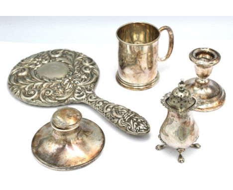 A small collection of silver items to include: an Elizabeth II silver hand mirror, with repousse scrolls of foliage design, h