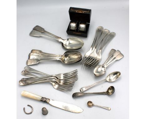 A collection of silver flatware to include: four matching Victorian fiddle patterned dessert spoons, hallmarked by Samuel Hay