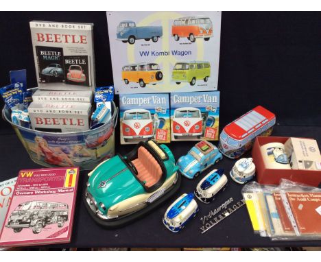 A collection of assorted Volkswagen ephemera and memorabilia to include: books, manuals, money boxes, radios and more. (one b
