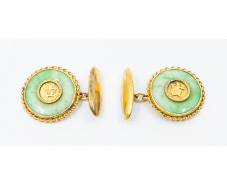 A pair of Chinese 18ct gold and jade set cufflinks, each inset to centre with gold Chinese script, within a border of jade an