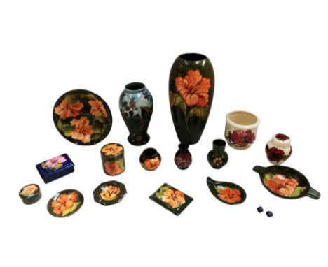 A collection of Moorcroft Pottery pieces to include vases, Jars , Bowls, Planter, Ash trays etc, in Bramble, Hisbiscus, Magno