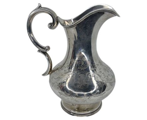 Victorian Silver Cream Jug. 211 g. John Harrison and Co., Sheffield 1862With chased floral work around the body of the jug.Co