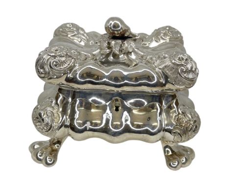 Large Silver Tea Caddy. 610 g. German c. 1900An impressive piece bith bulb formed body, embossed corners and paw feet with a 