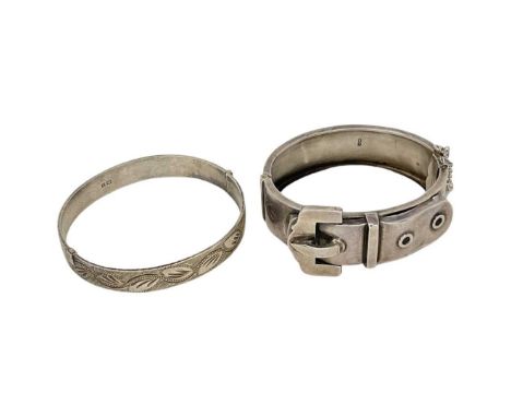 Two Silver Bangles , One Modelled as a Belt. 55 g. H.Bros, Birmingham 1883Good quality bangle modelled as a belt and another 