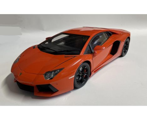 This Arancio Argos LP700-4 model was professionally finished and features the trademark scissor doors and opening engine cove
