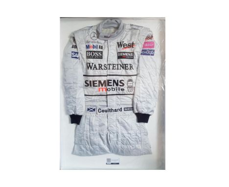 Offered with a Certificate of Authenticity from F1 Authentics, this suit was worn by the Scottish Formula 1 star and ITV spor