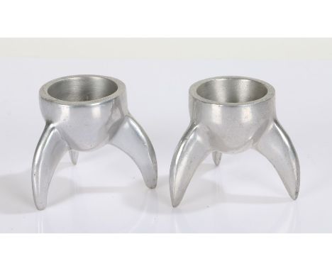 Pair of Art Deco style cast aluminium novelty egg cups, in the form of rocket fins, each 6cm high (2)