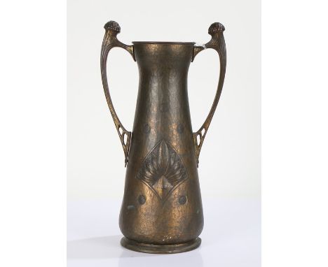 Aug. Dannhauer Chaudronnier, Geneve, Art Nouveau brass vase, having curved carrying handle either side, the spot hammered bod