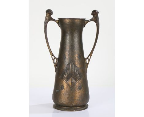 Aug. Dannhauer Chaudronnier, Geneve, Art Nouveau brass vase, having curved carrying handle either side, the spot hammered bod