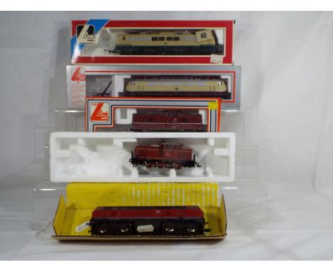 Model Railways - a collection four boxed and one on polystyrene tray, HO scale locomotives with three diesel and two electric