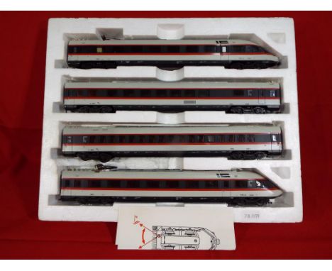 Model Railways - a Lima Golden Series HR gauge four car DB Intercity Donald Duck locomotive, boxed, loco and coaches in mint 