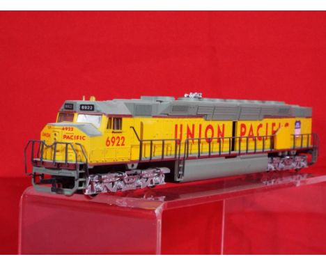 Model Railways - a boxed Bachmann HO gauge sixteen wheel diesel locomotive in Union Pacific colours named The Centennial DD40