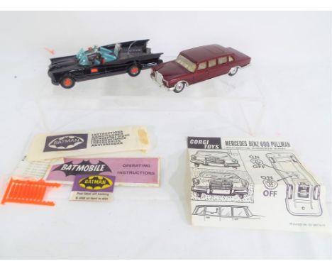 Corgi - two unboxed diecast model motor vehicles by Corgi to include The Bat Mobile with Batman and Robin, rockets and operat