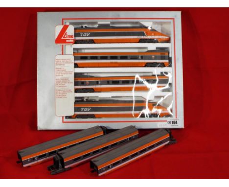 Model Railways - a four car TVG electric Lima HO gauge locomotive, boxed,  also included three additional coaches, unboxed, l
