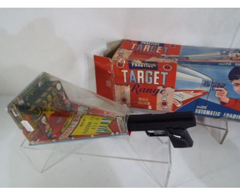 Louis Marx & Co. - a Practice Target Range game with automatic feed, excellent in original fair box.  Estimate £20 - £40