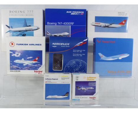 Herpa - a collection of eight boxed model aircraft in various scales, all in original boxes and in good to excellent conditio