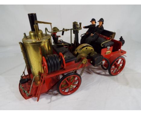 Wilesco Steam Fire Engine, Feuerwehr-Dampfspritze # D305, model of an early boiler steam driven Fire Engine with Hoses and th