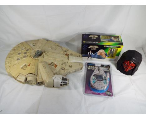 Star Wars - a good lot to include a 1970's Kenner Millennium Falcon model , a Star Wars Millennium Challenge electronic LCD g