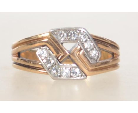 A Art Deco 18ct gold diamond ring with geometric hexagonal design with channel set diamonds. Diamonds total .20pts Weight 4.3