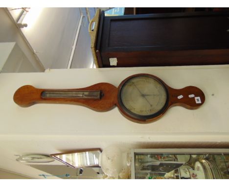 A barometer/ thermometer