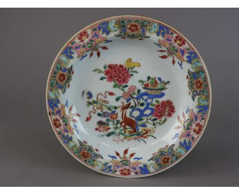 A pair of Chinese famille rose porcelain indented plates, Qing dynasty, Yongzheng, each decorated with a spotted deer beneath