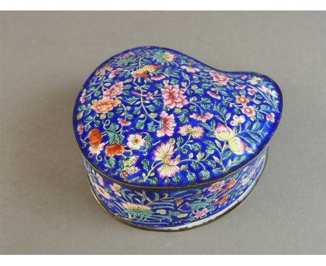 A canton enamel kidney shaped box and cover, Qing Dynasty, 19 th century, the cover decorated all over with a scrolling peony