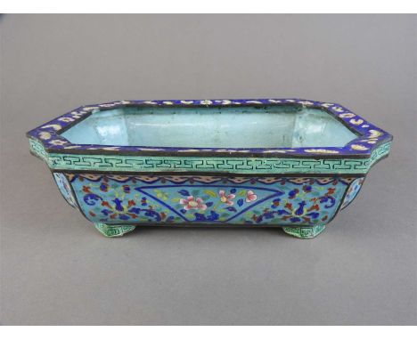 A canton enamel censer, Qing Dynasty, of rectangular form with shaped corners, the body decorated with panels of flowers bene
