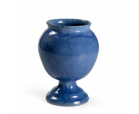 The globular body with stepped raised foot all under a light blue mottled glaze, unmarked 24cm high