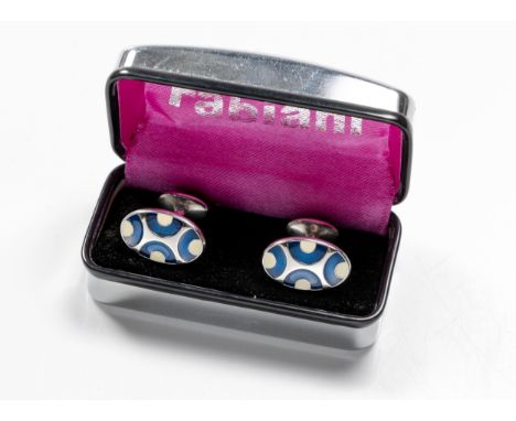 Blue and white circular enamel detailing with a fitted display case.