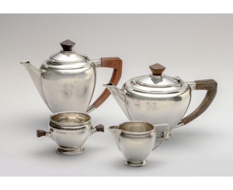 Comprising: a teapot, coffee pot, milk jug and sugar basin, the teapot and coffee pot with hinged cover, ebonised finial and 