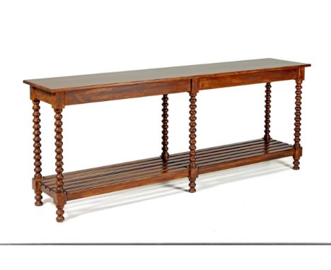 The rectangular top on bobbin turned supports, on block and bun feet, joined by a slatted shelf stretcher80,5cm high, 200cm w