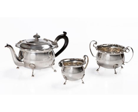 Comprising: a teapot, milk jug and sugar basin, each with an everted and moulded rim, the milk jug and sugar basin with C-scr