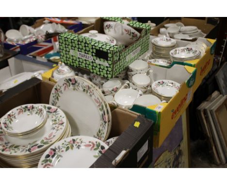 A LARGE COLLECTION OF WEDGWOOD HATHAWAY ROSE CHINA TO INCLUDE TUREENS, DINNER PLATES, CUPS AND SAUCERS, TEA AND COFFEE POTS E