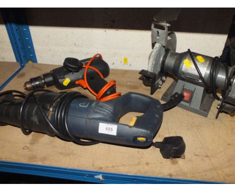 A MULTI PURPOSE ELECTRIC SAW PLUS A BLACK AND DECKER ELECTRIC DRILL AND A BENCH GRINDER