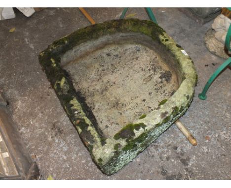 A LARGE STONE TROUGH
