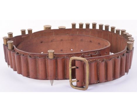 1917 Dated British Ammunition Bandolier, brown leather example with brass buckle fitting. Bandolier able to hold 42 rounds of